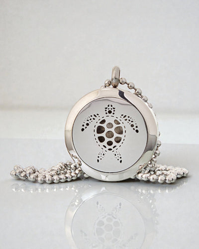 AromaTurtle – Collana aromaterapica con motivo di tartaruga 25 mm in acciaio inossidabile