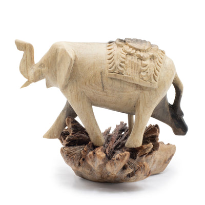 Figurine d'éléphant sculptée à la main en bois parasite