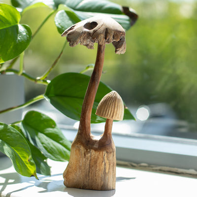 Scultura artigianale in legno parassita