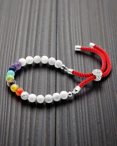 Royal Harmony Chakra – Bracelet en howlite blanche et argent 925 sur cordon rouge