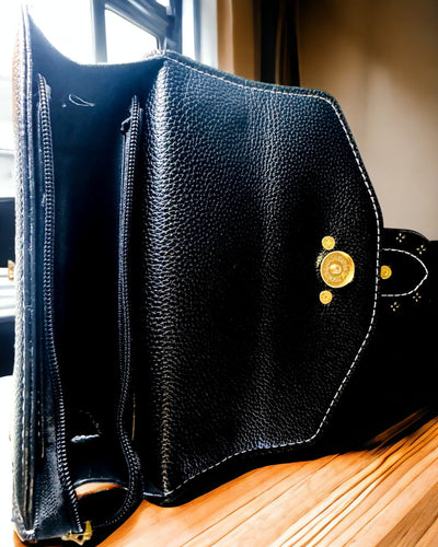 Fashionable Square Shoulder Bag with Lion Accent - color black