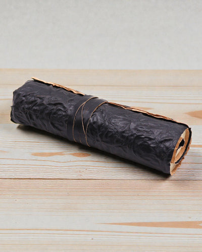 Carnet de voyage en cuir enroulé - 96 pages - Noir 21x15cm